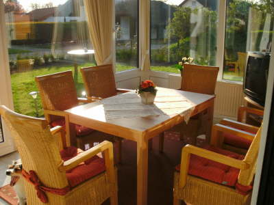 Wintergarten vom Wohnzimmer gesehen